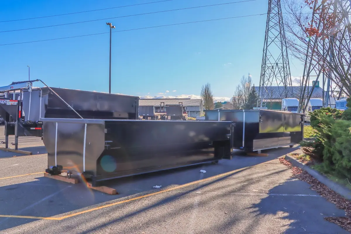 Roll-off dumpster ready for waste disposal at job site for Construction Dumpster Rental in DeWitt